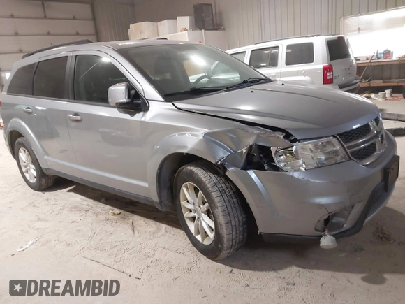2015 Dodge Journey SXT with VIN 3C4PDDBG4FT544162, listed as a IAAI auction lot 41320028 with 128,475 mi miles and . Bid and sale history available at DreamBid. Image 1.