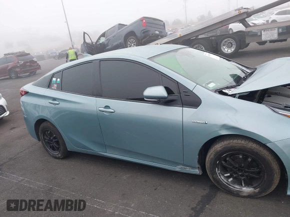 2022 Toyota Prius L Eco with VIN JTDKAMFU9N3186859, listed as a IAAI auction lot 41486941 with 122,665 mi miles and . Bid and sale history available at DreamBid. Image 13.