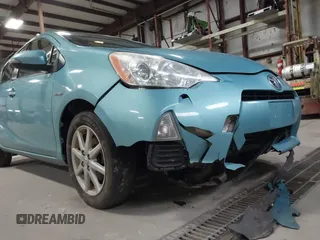2014 Toyota Prius One z VIN JTDKDTB3XE1060360, wystawiony jako IAAI lot #41972531 z przebiegiem 140 012 mil mil oraz . Historia ofert i sprzedaży dostępna na DreamBid. Obrazek 6.