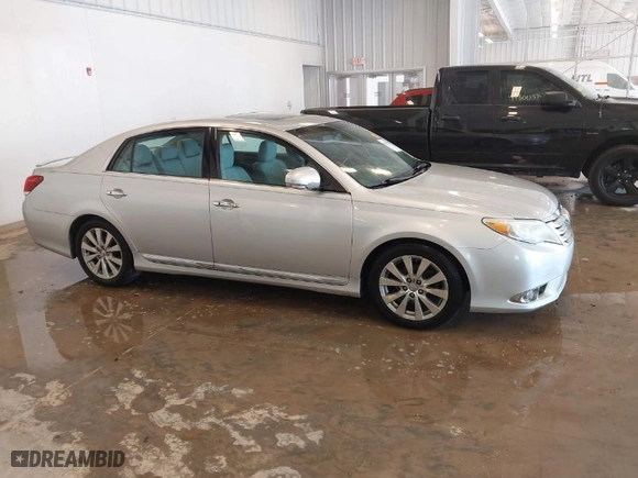 2012 Toyota Avalon with VIN 4T1BK3DB8CU468955, listed as a IAAI auction lot 41805238 with 180,836 mi miles. Bid and sale history available at carsss.com. Image 13.