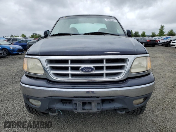 2000 Ford F-150 XL z VIN 1FTRX18L5YNA10836, wystawiony jako Copart lot #55325245 z przebiegiem 188 237 mil mil oraz Szkoda całkowita • Salvage title. Historia ofert i sprzedaży dostępna na DreamBid. Obrazek 5.