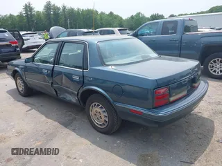 1994 Oldsmobile Cutlass Ciera S z VIN 1G3AG55M3R6441530, wystawiony jako IAAI lot #42404529 z przebiegiem 78 518 mil mil oraz . Historia ofert i sprzedaży dostępna na DreamBid. Obrazek 3.
