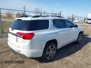2019 GMC Acadia Denali with VIN 1GKKNXLSXKZ173883, listed as a IAAI auction lot 41863843 with 85,067 mi miles and . Bid and sale history available at carsss.com. Image 4.