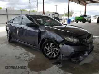 2017 Honda Civic LX with VIN 19XFC2F56HE206118, listed as a Copart auction lot 58777885 with 59,710 mi miles and Salvage title. Bid and sale history available at DreamBid. Image 4.