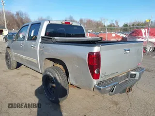 2012 GMC Canyon SLE1 with VIN 1GTH6MFE2C8106354, listed as a IAAI auction lot 41910921 with 127,812 mi miles. Bid and sale history available at carsss.com. Image 3.