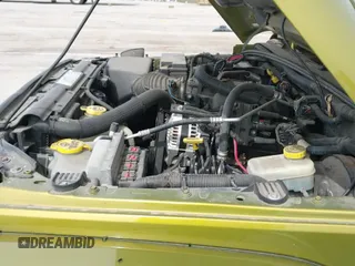 2007 Jeep Wrangler Unlimited Sahara z VIN 1J8GA59167L161894, wystawiony jako IAAI lot #41856064 z przebiegiem 122 714 mil mil oraz . Historia ofert i sprzedaży dostępna na DreamBid. Obrazek 20.