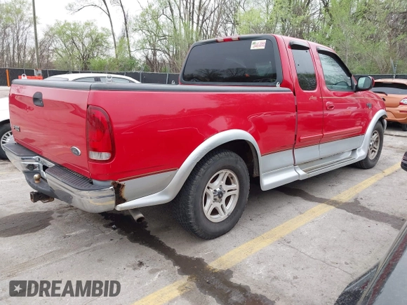 2000 Ford F-150 XL with VIN 1FTRX17L8YKA93634, listed as a IAAI auction lot 41957761 with 170,933 mi miles. Bid and sale history available at carsss.com. Image 4.