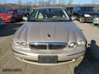 2004 Jaguar X-Type with VIN SAJEA51C14WE01928, listed as a Copart auction lot 80456434 with 32,776 mi miles and Salvage Title. Bid and sale history available at carsss.com. Image 5.