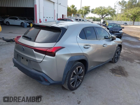 2020 Lexus UX 250h with VIN JTHX9JBHXL2033589, listed as a IAAI auction lot 42113363 with 71,669 mi miles and . Bid and sale history available at DreamBid. Image 4.
