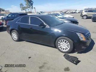 2013 Cadillac CTS Luxury с VIN 1G6DG5E50D0111154, выставлен на аукционе Copart как лот 75872384 с пробегом 102 151 миль миль и На запчасти • Non repairable. История ставок и продаж доступна на DreamBid. Изображение 4.