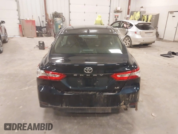 2020 Toyota Camry LE with VIN 4T1C11AK5LU926564, listed as a IAAI auction lot 41864812 with 104,212 mi miles and . Bid and sale history available at carsss.com. Image 16.
