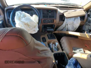 1998 Jeep Grand Cherokee with VIN 1J4GX48Y7WC216585, listed as a Copart auction lot 83532184 with 144,739 mi miles and Salvage title. Bid and sale history available at DreamBid. Image 8.