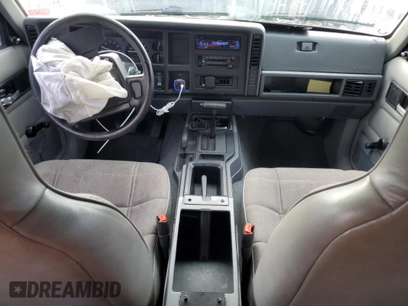1996 Jeep Cherokee Sport with VIN 1J4FJ68S4TL240696, listed as a Copart auction lot 81193184 with 125,682 mi miles and Salvage Title. Bid and sale history available at carsss.com. Image 8.