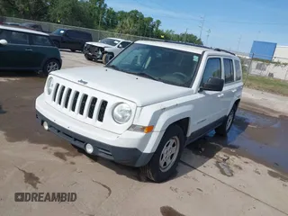 2016 Jeep Patriot Sport with VIN 1C4NJPBA3GD693490, listed as a IAAI auction lot 42086206 with 130,968 mi miles. Bid and sale history available at carsss.com. Image 2.