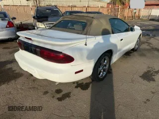 1997 Pontiac Firebird with VIN 2G2FS32K3V2232171, listed as a Copart auction lot 46740375 with 64,745 mi miles and Salvage Title. Bid and sale history available at carsss.com. Image 4.