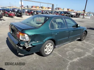 1999 Honda Civic EX z VIN 2HGEJ8647XH528203, wystawiony jako Copart lot #57507315 z przebiegiem 185 450 mil mil oraz Szkoda całkowita • Salvage title. Historia ofert i sprzedaży dostępna na DreamBid. Obrazek 3.