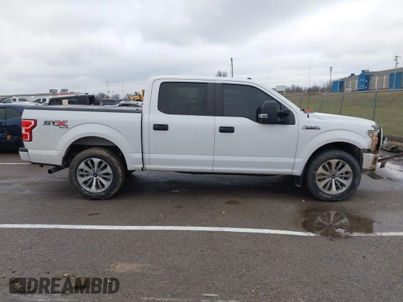 2018 Ford F-150 XL with VIN 1FTEW1E59JKD99284, listed as a IAAI auction lot 41203530 with 153,800 mi miles. Bid and sale history available at carsss.com. Image 13.