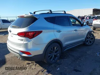2018 Hyundai Santa Fe Ultimate with VIN 5XYZW4LAXJG554420, listed as a IAAI auction lot 41628371 with 65,436 mi miles and . Bid and sale history available at DreamBid. Image 4.