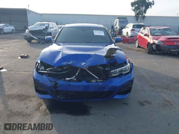 2019 BMW 3 Series 330i xDrive with VIN WBA5R7C50KAE82705, listed as a IAAI auction lot 41233898 with 69,505 mi miles. Bid and sale history available at carsss.com. Image 13.