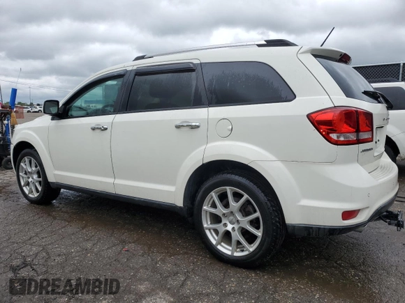 2013 Dodge Journey Crew with VIN 3C4PDCDG9DT537552, listed as a Copart auction lot 58126615 with 96,884 mi miles and Salvage title. Bid and sale history available at DreamBid. Image 2.