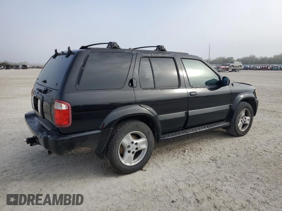 2001 Infiniti QX4 with VIN JNRDR09X21W204207, listed as a Copart auction lot 79935604 with Not Provided miles and Salvage Title. Bid and sale history available at DreamBid. Image 3.