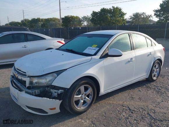 2014 Chevrolet Cruze 1LT with VIN 1G1PC5SBXE7251617, listed as a IAAI auction lot 41854990 with 128,691 mi miles. Bid and sale history available at carsss.com. Image 2.
