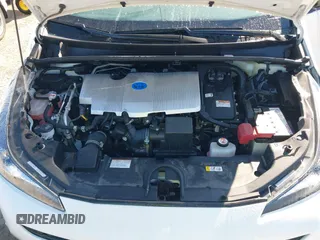 2022 Toyota Prius L Eco with VIN JTDKAMFUXN3163123, listed as a IAAI auction lot 41666679 with 68,026 mi miles. Bid and sale history available at carsss.com. Image 10.