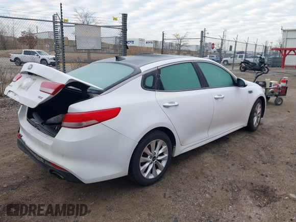 2016 Kia Optima EX with VIN 5XXGU4L31GG027250, listed as a IAAI auction lot 41881343 with 135,635 mi miles. Bid and sale history available at carsss.com. Image 4.