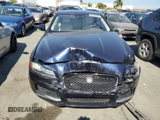 2016 Jaguar XF 35t Premium with VIN SAJBD4BV0GCY21512, listed as a Copart auction lot 66726984 with 129,346 mi miles and Salvage Title. Bid and sale history available at carsss.com. Image 5.