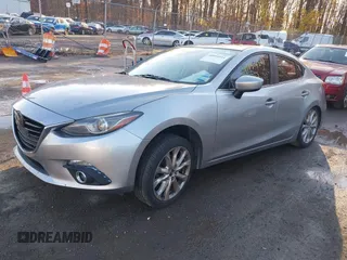 2014 Mazda 3 S Grand Touring with VIN JM1BM1W38E1184450, listed as a IAAI auction lot 40954511 with 157,036 mi miles and . Bid and sale history available at DreamBid. Image 16.