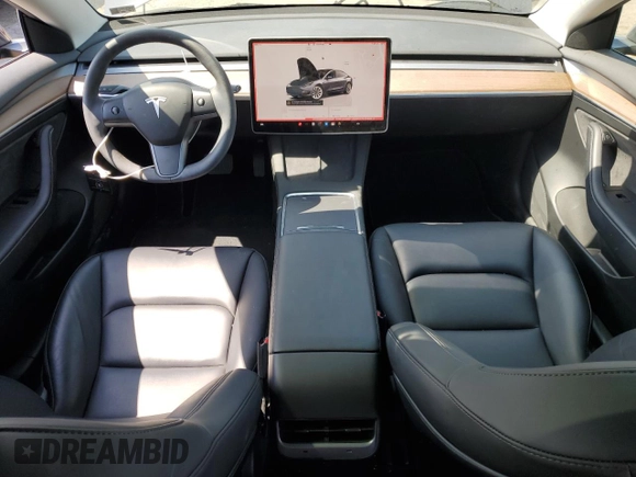 2023 Tesla Model 3 Long Range with VIN 5YJ3E1EB2PF389041, listed as a Copart auction lot 53450725 with 27,060 mi miles and Salvage Title. Bid and sale history available at DreamBid. Image 8.