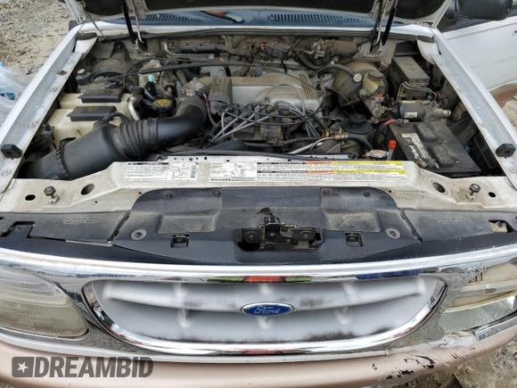 1996 Ford Explorer XLT z VIN 1FMDU32P1TZB95989, wystawiony jako Copart lot #60714735 z przebiegiem 166 081 mil mil oraz Szkoda całkowita • Salvage title. Historia ofert i sprzedaży dostępna na DreamBid. Obrazek 12.