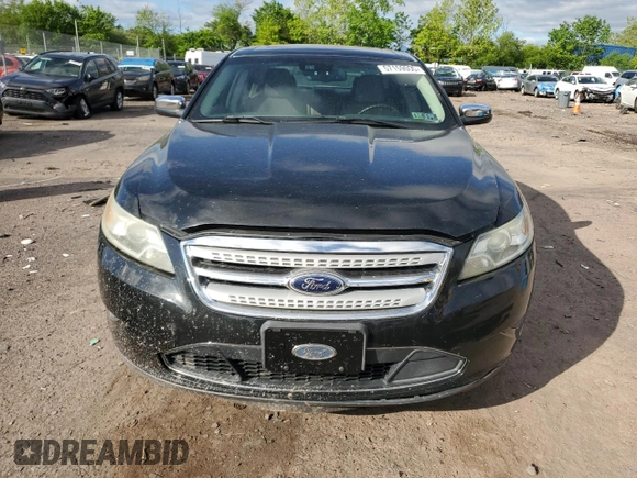 2012 Ford Taurus Limited z VIN 1FAHP2FW6CG136463, wystawiony jako Copart lot #57159005 z przebiegiem 124 833 mil mil oraz Szkoda całkowita • Salvage title. Historia ofert i sprzedaży dostępna na DreamBid. Obrazek 5.
