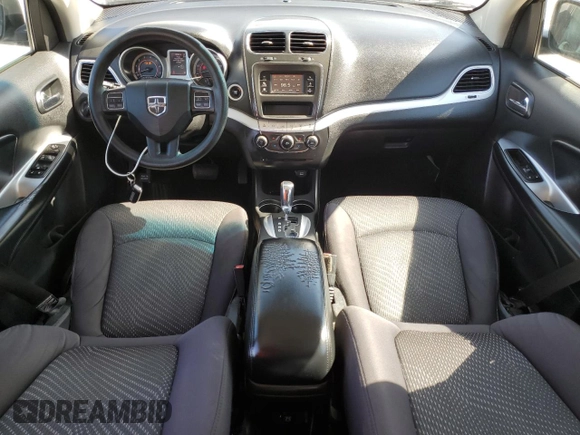 2013 Dodge Journey American Value with VIN 3C4PDCAB1DT715799, listed as a Copart auction lot 52404815 with 185,559 mi miles and Salvage Title. Bid and sale history available at DreamBid. Image 8.