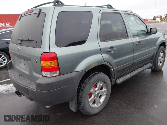 2006 Ford Escape XLT with VIN 1FMYU03126KC55897, listed as a IAAI auction lot 41733243 with 136,989 mi miles. Bid and sale history available at carsss.com. Image 4.