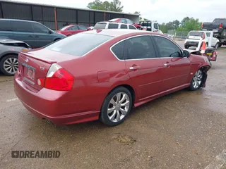 2006 Infiniti M z VIN JNKAY01E96M106728, wystawiony jako IAAI lot #42072634 z przebiegiem 138 275 mil mil oraz . Historia ofert i sprzedaży dostępna na DreamBid. Obrazek 4.