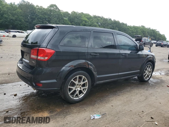 2013 Dodge Journey R/T with VIN 3C4PDDEG7DT677135, listed as a Copart auction lot 60256295 with 190,387 mi miles and Salvage title. Bid and sale history available at DreamBid. Image 3.