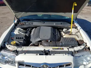 2005 Chrysler 300 C with VIN 2C3JA63HX5H530134, listed as a IAAI auction lot 41143214 with 176,917 mi miles and . Bid and sale history available at carsss.com. Image 10.