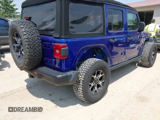 2018 Jeep Wrangler Unlimited Rubicon with VIN 1C4HJXFG8JW184793, listed as a IAAI auction lot 42429098 with 86,580 mi miles and . Bid and sale history available at DreamBid. Image 4.
