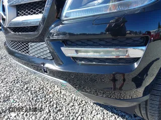 2013 Mercedes-Benz GL-Class GL 450 with VIN 4JGDF7CE5DA175209, listed as a IAAI auction lot 40466251 with 80,770 mi miles. Bid and sale history available at carsss.com. Image 6.