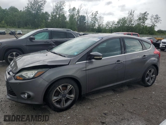2014 Ford Focus Titanium with VIN 1FADP3N20EL329415, listed as a Copart auction lot 60881115 with 97,382 mi miles and Salvage title. Bid and sale history available at DreamBid. Image 1.