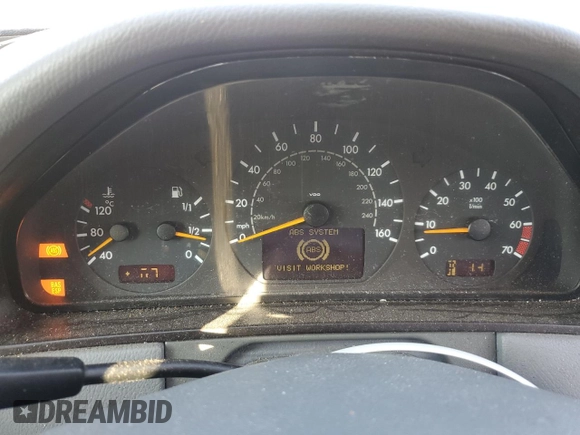 2000 Mercedes-Benz E-Class with VIN WDBJF65J3YB167247, listed as a Copart auction lot 75715464 with 0 mi miles and Salvage Title. Bid and sale history available at carsss.com. Image 9.