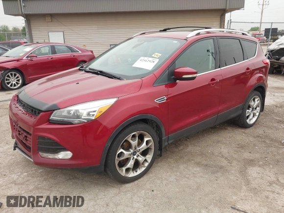 2015 Ford Escape Titanium with VIN 1FMCU9J96FUC02177, listed as a IAAI auction lot 42312928 with 100,716 mi miles and . Bid and sale history available at DreamBid. Image 2.