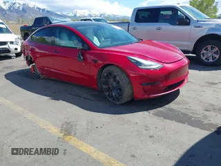 2022 Tesla Model 3 Performance z VIN 5YJ3E1EC6NF127433, wystawiony jako IAAI lot #42055656 z przebiegiem 60 352 mil mil oraz . Historia ofert i sprzedaży dostępna na DreamBid. Obrazek 1.