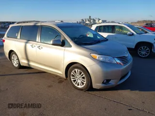 2016 Toyota Sienna XLE with VIN 5TDYK3DC8GS713481, listed as a IAAI auction lot 41239824 with 176,935 mi miles. Bid and sale history available at carsss.com. Image 1.