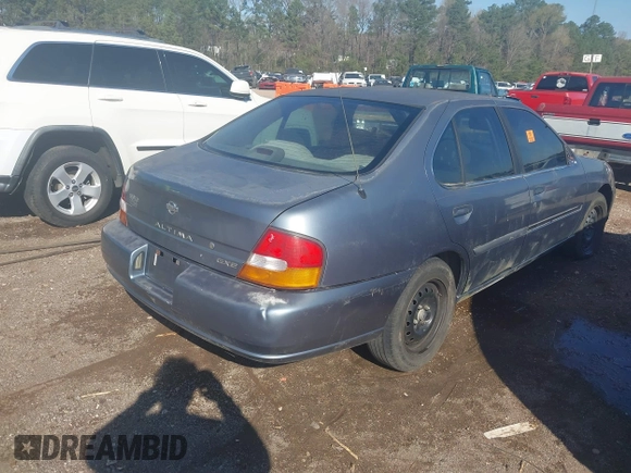 1999 Nissan Altima XE with VIN 1N4DL01D1XC224886, listed as a IAAI auction lot 41813614 with 236,373 mi miles. Bid and sale history available at carsss.com. Image 4.