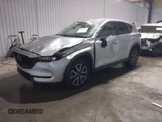 2018 Mazda CX-5 Touring with VIN JM3KFBCM7J0347769, listed as a IAAI auction lot 41611985 with 158,579 mi miles. Bid and sale history available at carsss.com. Image 18.
