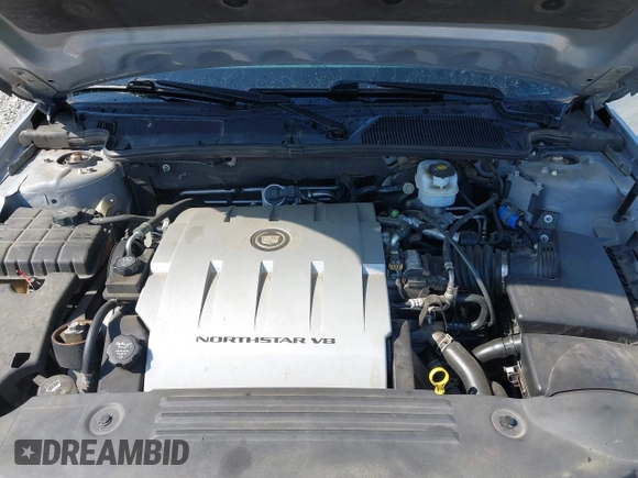 2006 Cadillac DTS 1SD z VIN 1G6KD57Y86U110272, wystawiony jako IAAI lot #42059673 z przebiegiem 147 610 mil mil oraz . Historia ofert i sprzedaży dostępna na DreamBid. Obrazek 10.