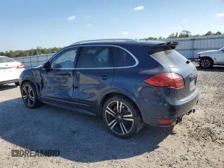 2014 Porsche Cayenne Turbo with VIN WP1AC2A27ELA87214, listed as a Copart auction lot 74175554 with 122,988 mi miles and Salvage title. Bid and sale history available at DreamBid. Image 2.