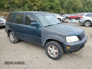 1998 Honda CR-V EX with VIN JHLRD1862WC033733, listed as a Copart auction lot 74044054 with 250,742 mi miles and Salvage Title. Bid and sale history available at carsss.com. Image 4.